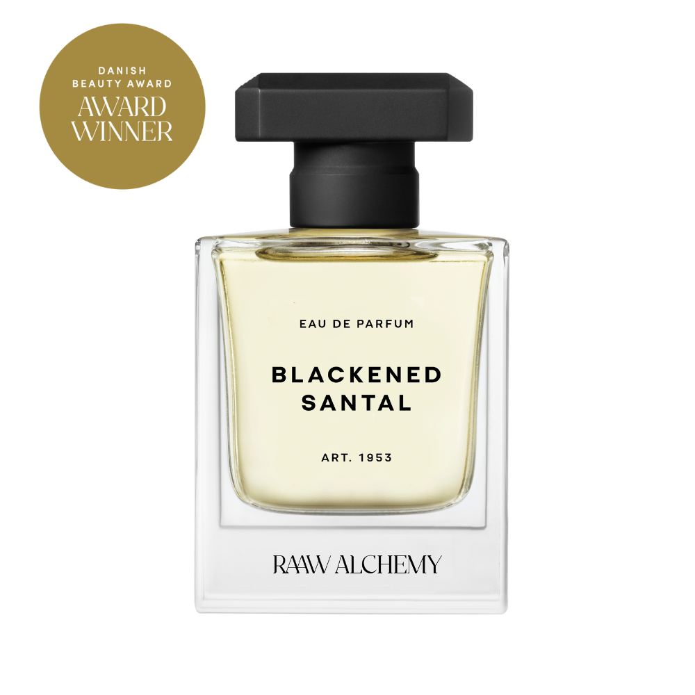 RAAW Alchemy Blackened Santal Eau de Parfum – Danish Beauty Award winner in a classic square glass bottle with a black cap.