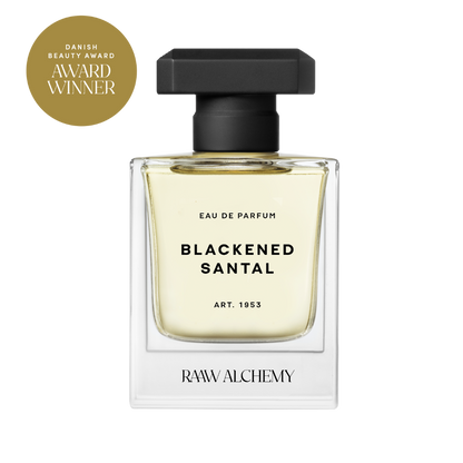 RAAW Alchemy Blackened Santal Eau de Parfum – Danish Beauty Award winner in a classic square glass bottle with a black cap.