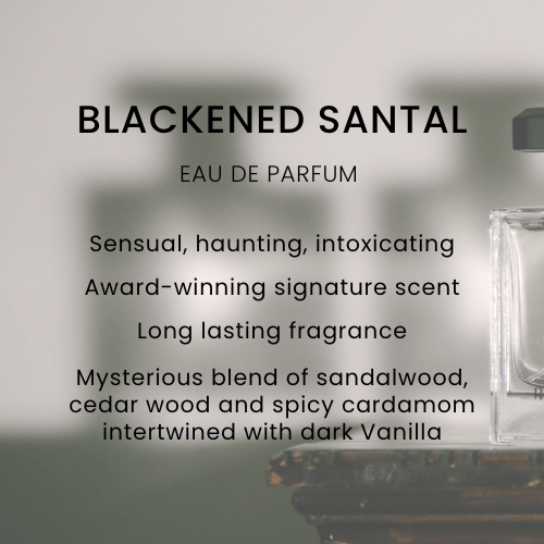 Text overlay describing Blackened Santal Eau de Parfum as a sensual and intoxicating signature scent with notes of sandalwood, cedar wood, spicy cardamom, and dark vanilla.