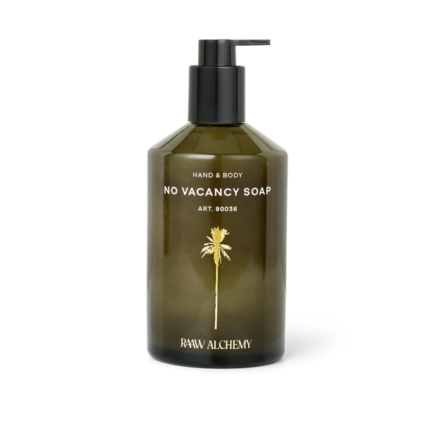 RAAW Alchemy Hand & Body Soap – luxurious organic soap in a signature green glass bottle with pump.