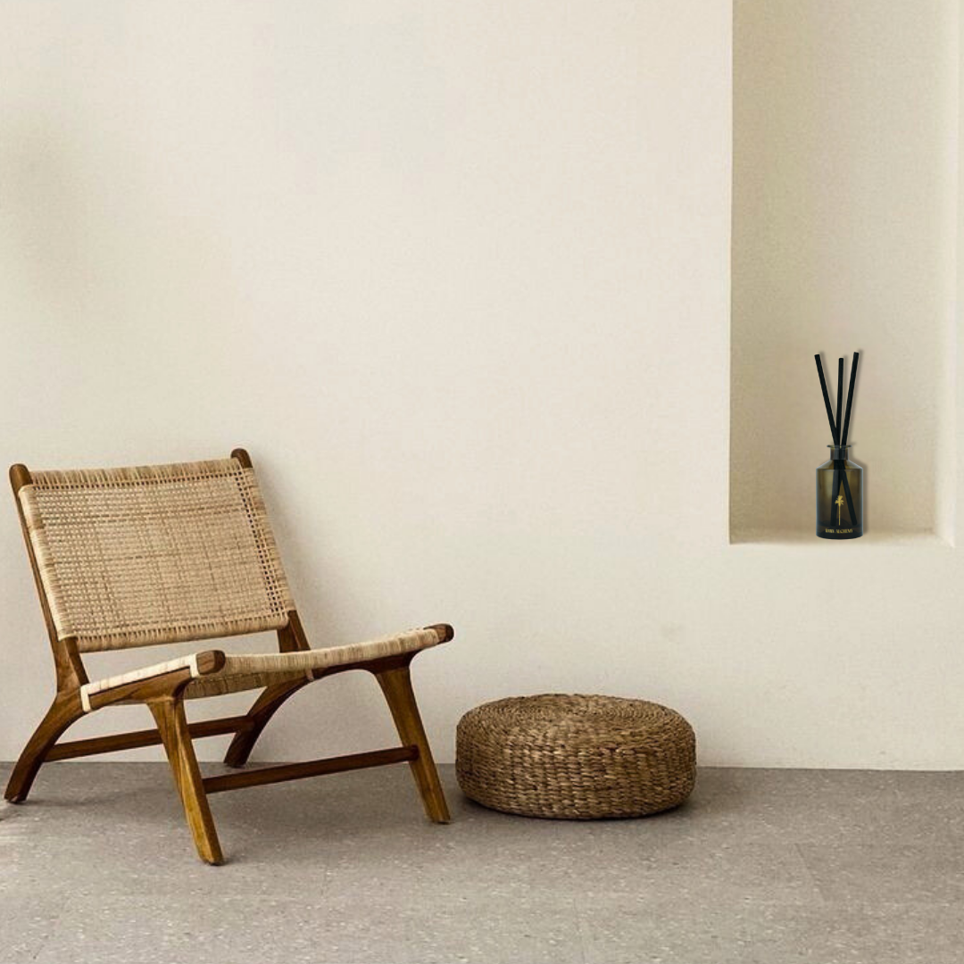 RAAW Alchemy Minted Fig diffuser placed on a minimalist wall shelf as a luxury home decor element.