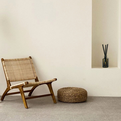 RAAW Alchemy Minted Fig diffuser placed on a minimalist wall shelf as a luxury home decor element.