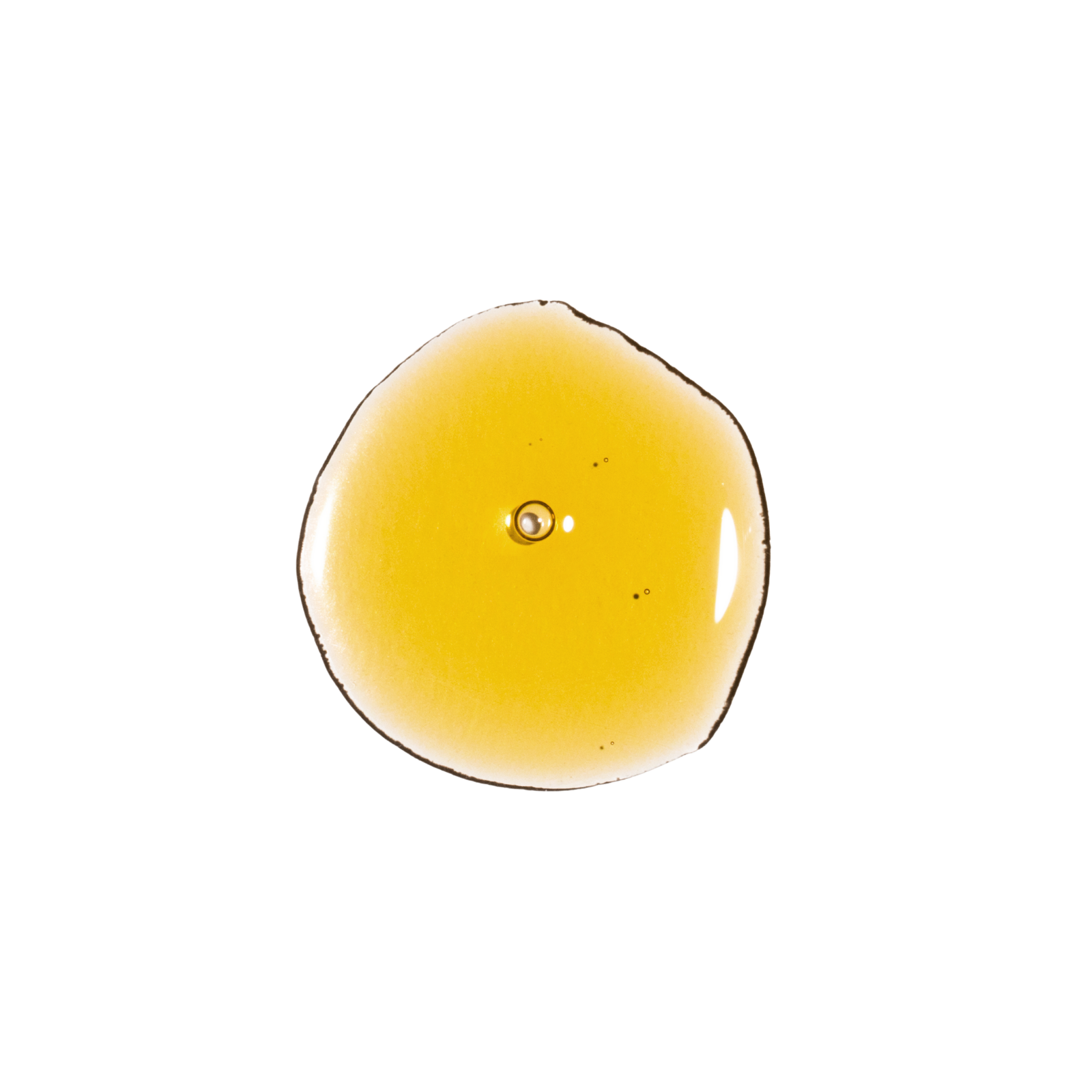 Golden texture drop of RAAW Alchemy Velvet Cocoon Body Oil showing the rich and nourishing consistency.